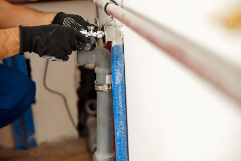 plumber at work in Perth