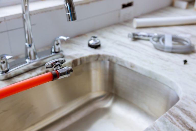 Plumber in pipe connection sink installation --Emergency Plumbers Beldon