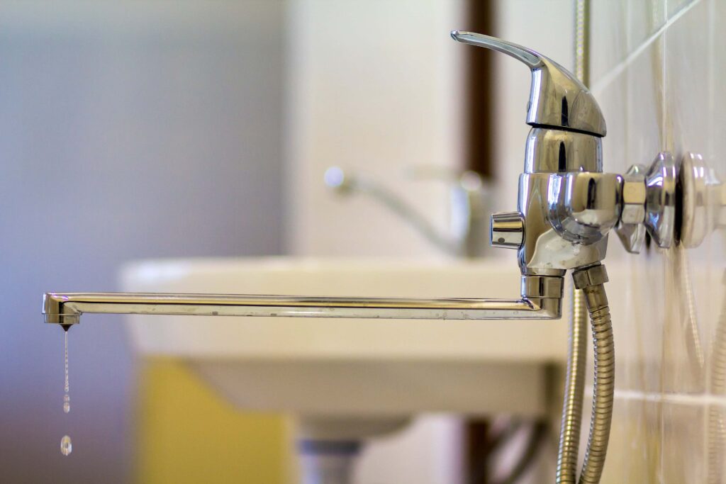 Leak Repair , Chrome faucet with water droplet, tap repair by Plumb It Right-Leak repair Ashfield