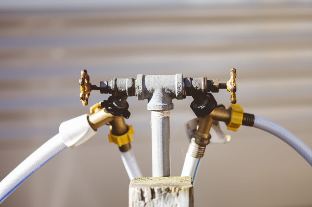 Backflow Prevention  – plumbing pipes with valves and hose connections-Backflow Prevention Burns Beach